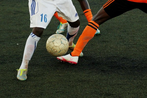 What are effective strategies for sports-based community outreach and engagement?